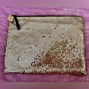 BCBG chain mesh zip pouch.